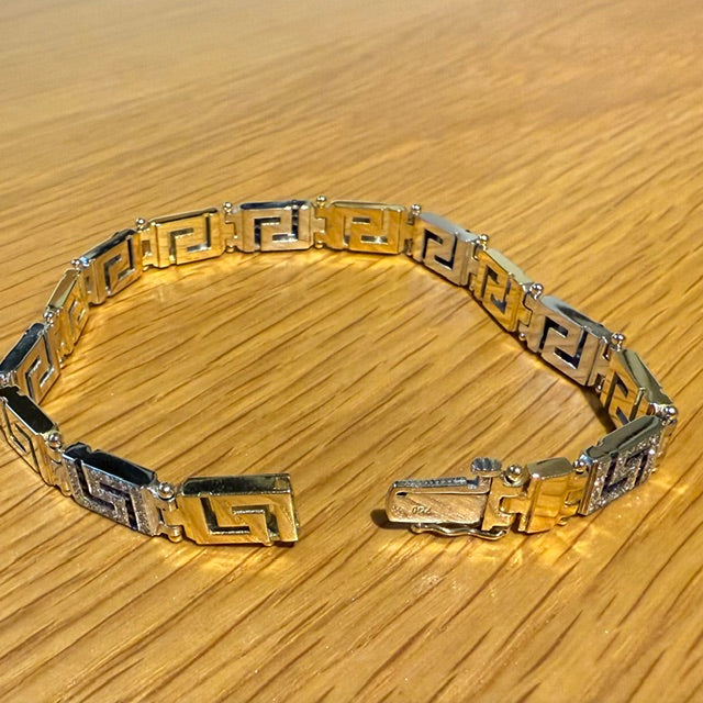 18CT YELLOW AND WHITE GOLD DIAMOND AND SAPPHIRE GREEK KEY BRACELET