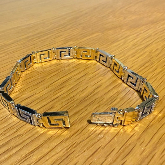 18CT YELLOW AND WHITE GOLD DIAMOND AND SAPPHIRE GREEK KEY BRACELET
