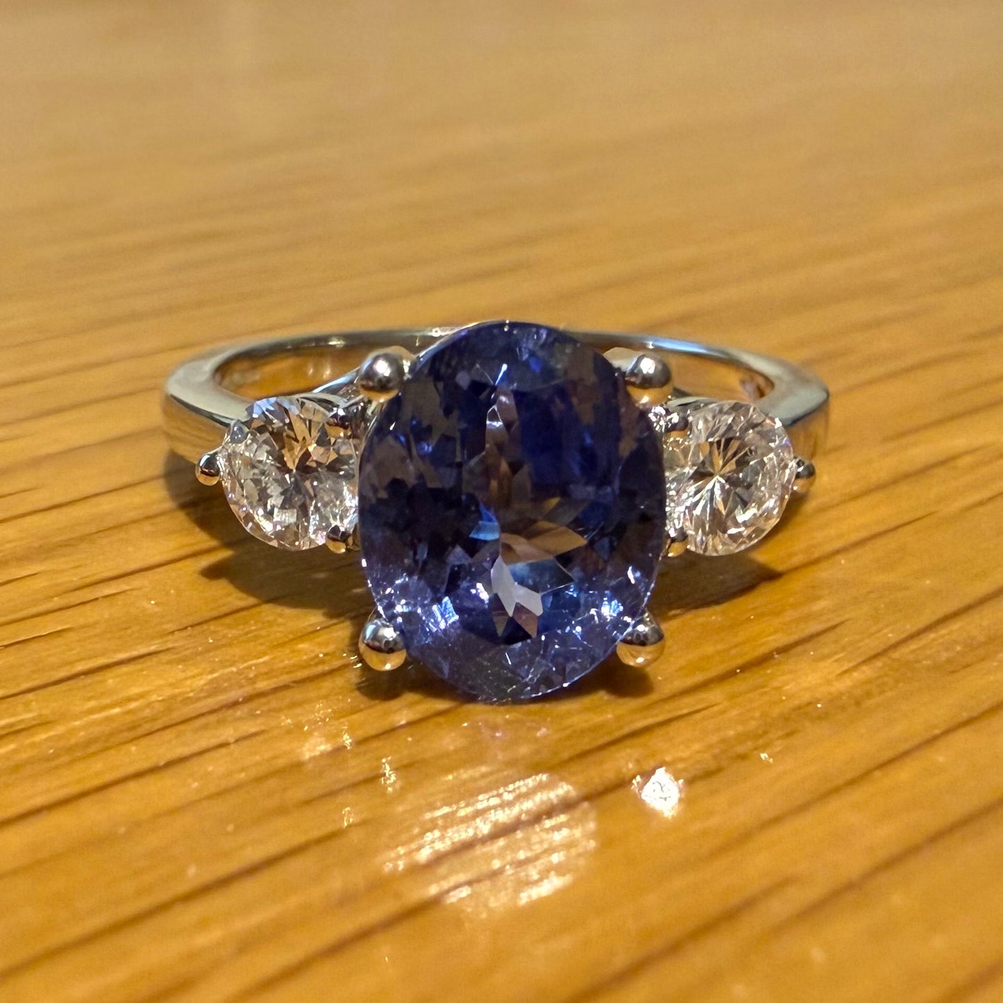 18CT WHITE GOLD TANZANITE AND DIAMOND RING